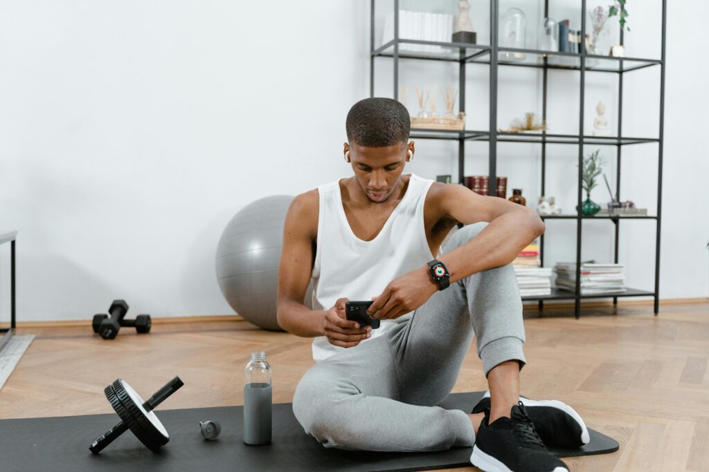 guy taking a break during his home workout