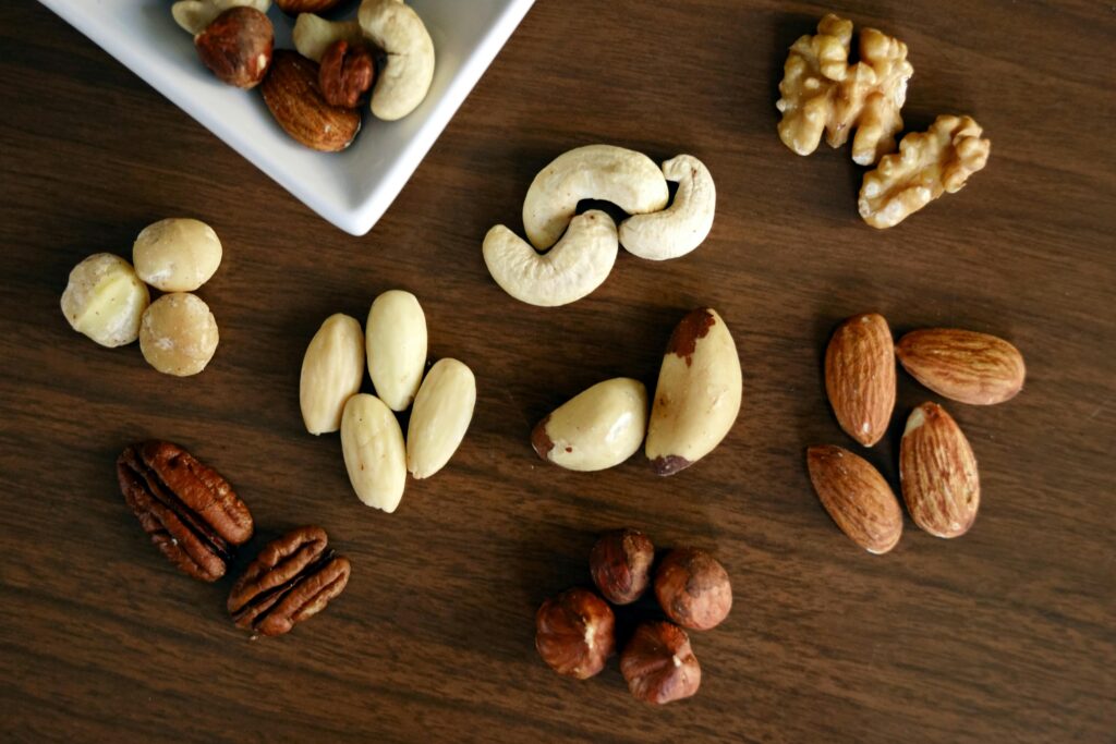 table of various types of nuts, representing pre workout snacks for muscle gain